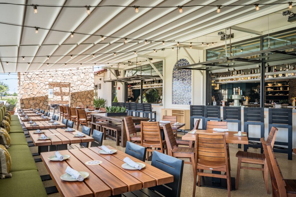 Image of exterior furniture built by SouthLoft for Mexican Sugar's patio.