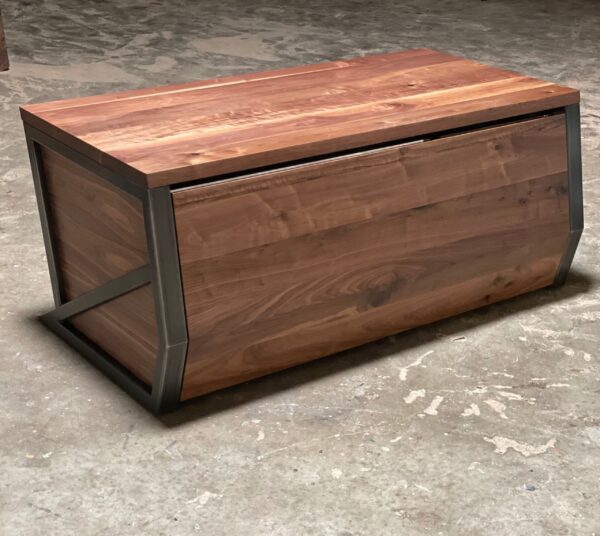 South Loft industrial walnut desk with steel framing on a concrete floor.