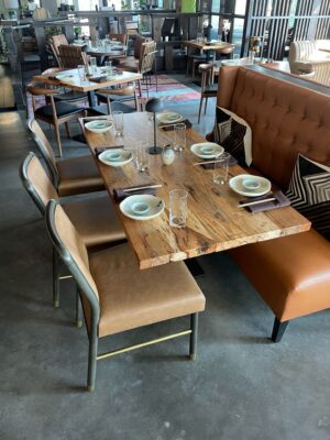 Rectangular tabletop built by SouthLoft sits in sushi restaurant's dining room.