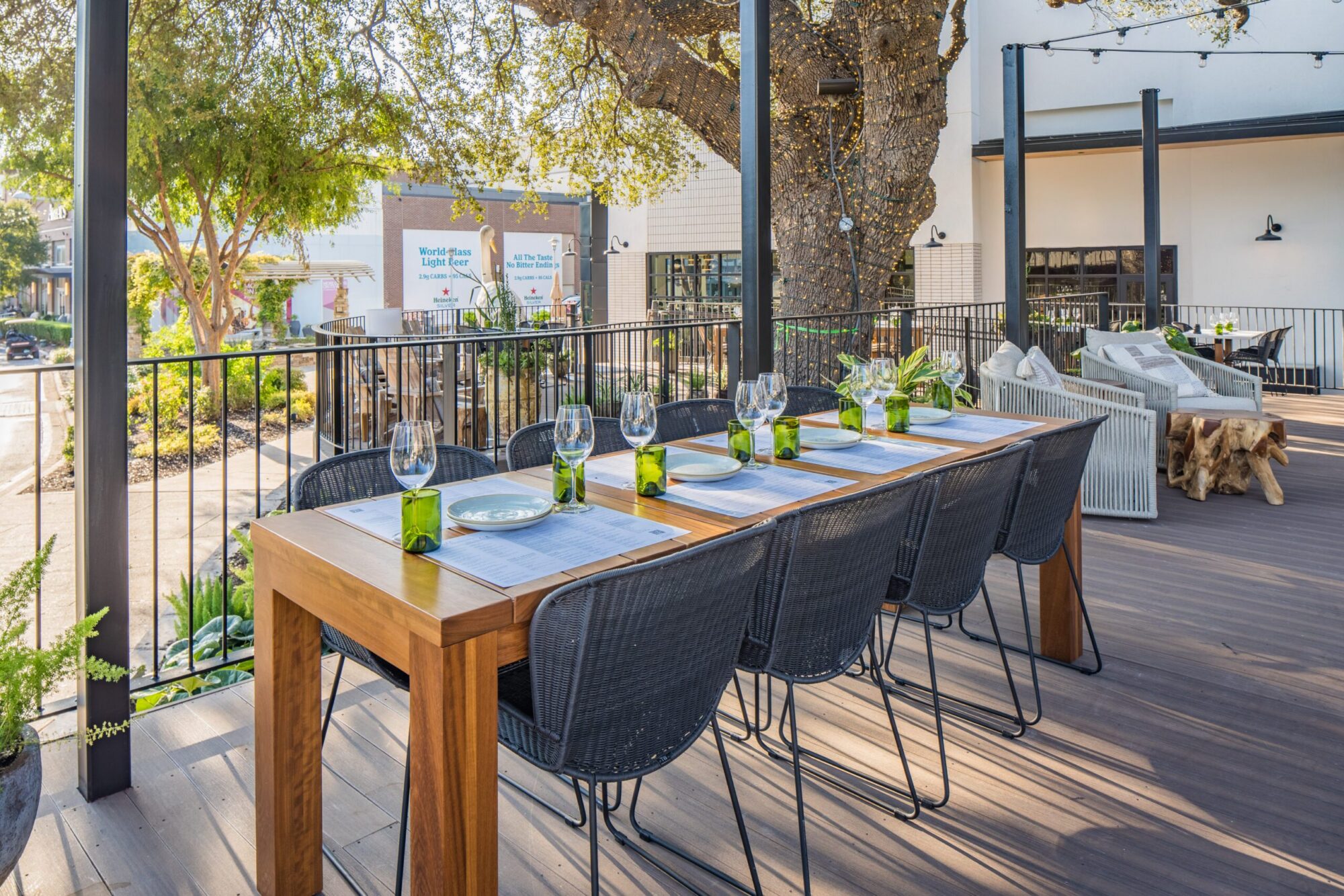 A SoutLoft built parsons dining table is set at a luxury restaurant chain.